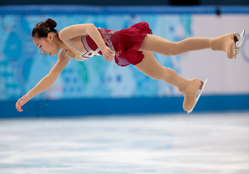 Illustration for article titled Amazing Images of Olympic Figure Skaters Defying Gravity